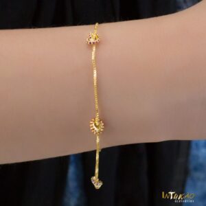 Pulseira dourada nó Intuê zirconias coloridas banhado a ouro 18k Pulseira dourada nó Intuê zirconias coloridas banhado a ouro 18k